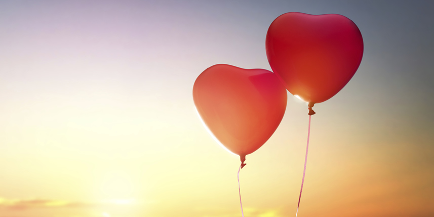 two-heart-ballons-representing-couple-in-love