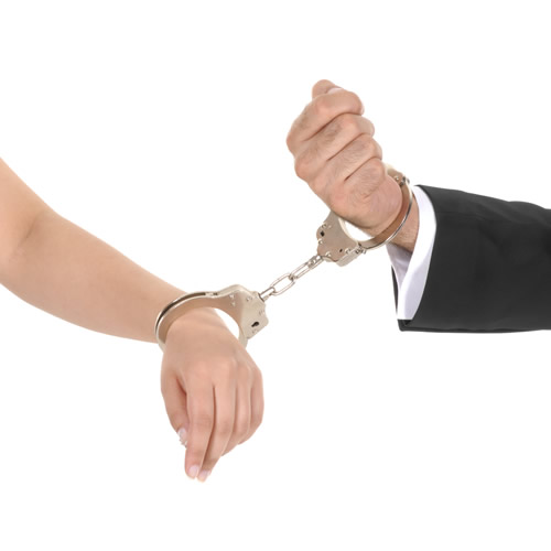 man-and-woman-chained-in-handcuffs
